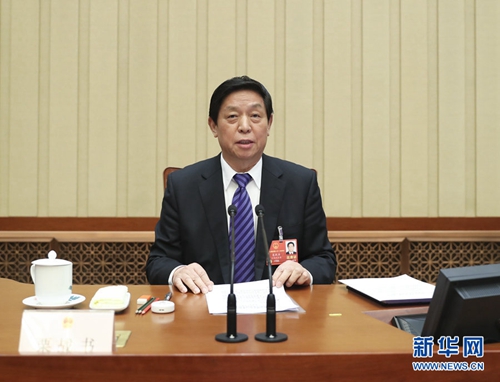 　　3月18日，十三届全国人大一次会议主席团在北京人民大会堂举行第九次会议。主席团常务主席栗战书主持会议。 新华社记者 谢环驰 摄