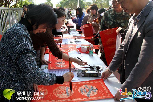 迎新春 送春联 书法家挥毫为新区职工送祝福