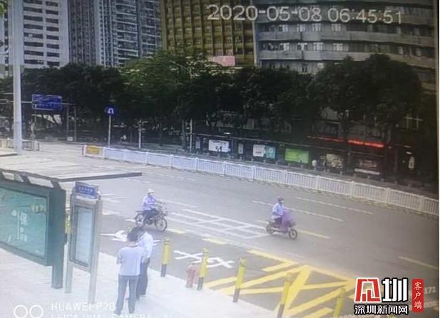 两名环卫工驾驶非机动车在深南路机动车道骑行