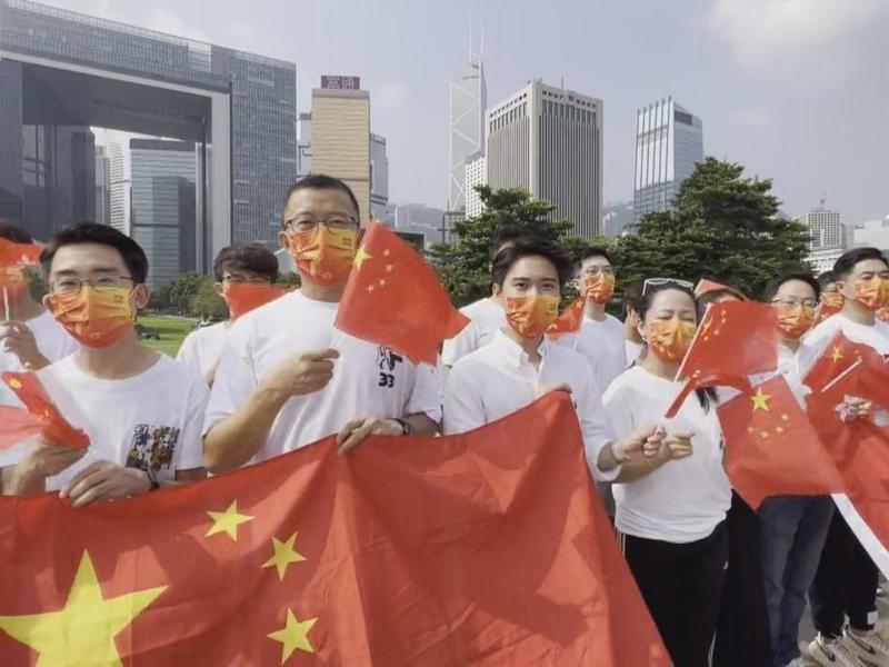 香港各界欢度完善选举制度后首个国庆节，真正踏上“一国两制”