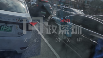 宝安一路口交通乱象引关注 标识不足+违规左转致险象环生